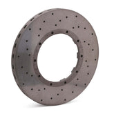 A TTSPORT carbon ceramic brake rotor with a drilled design, shown on a white background, engineered for high-performance street cars.