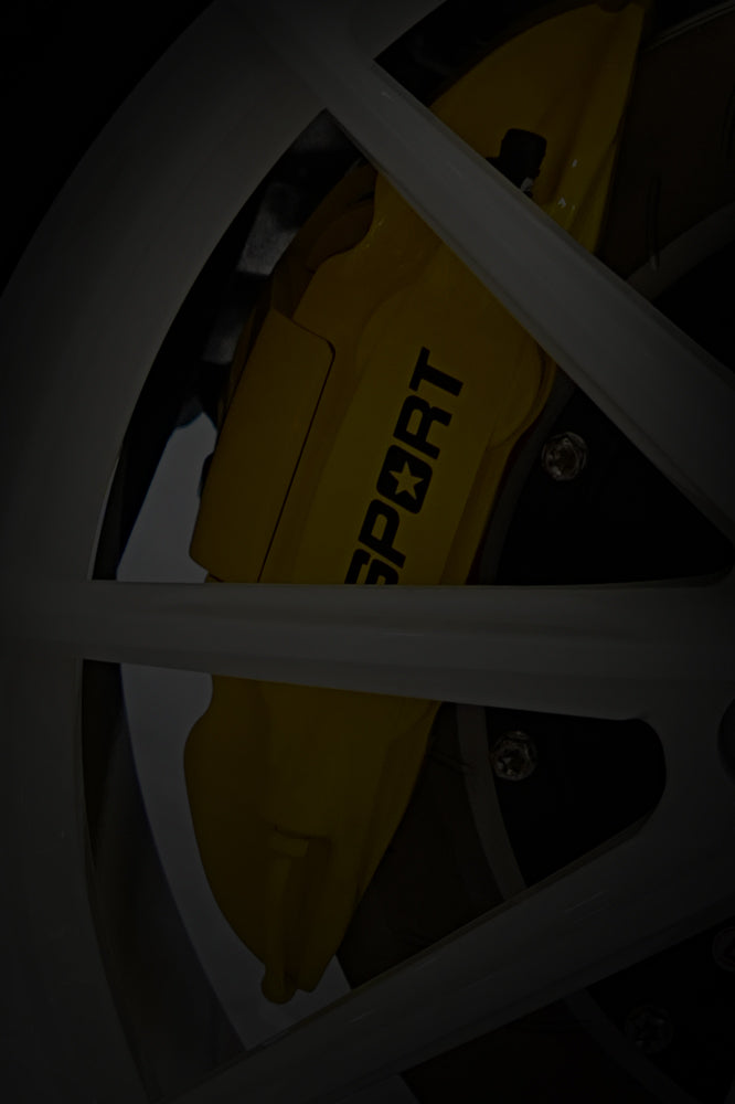 A yellow TTSPORT EPB series 1-piston rear brake kit.
