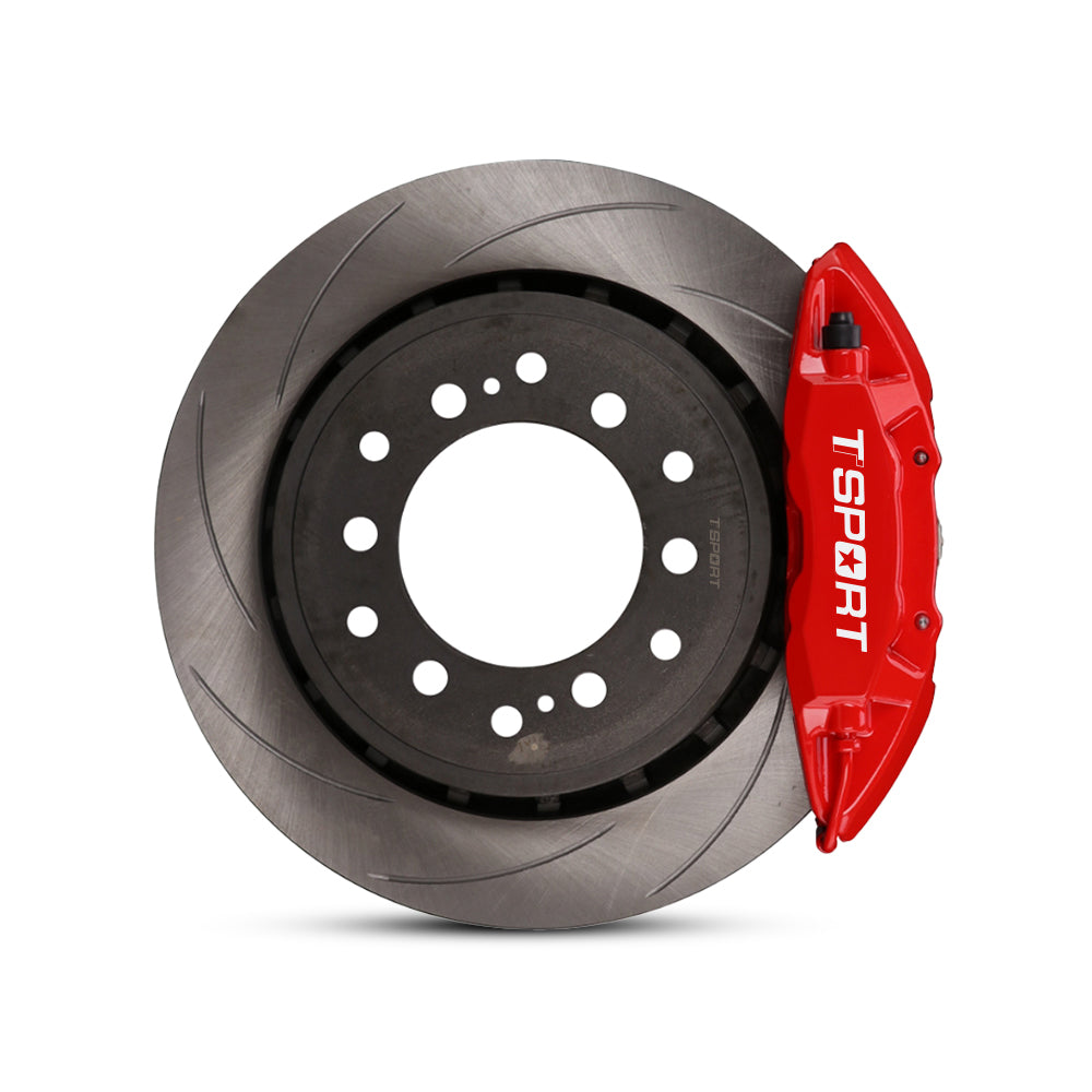 Close-up of a red TTSPORT Toyota Land Cruiser and Prado 4-piston forged brake caliper for the rear wheel and a slotted 2-piece rotor.