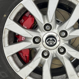 A red TTSPORT Toyota LC150 Prado 6-piston big brake kit is installed on the front wheel.