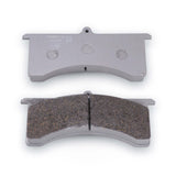 A set of TTSPORT 05 high-friction and fade free racing brake pads with on a white background, designed for drift and rally racing cars.